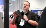 Brent Condie from FLIR Systems shows off one of the company&rsquo;s latest infrared viewing devices and explains its benefits to contractors