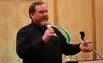 Mark Eatherton, executive director of the Radiant Professionals Alliance, speaks to members during an RPA event at the 2017 AHR Expo in Las Vegas