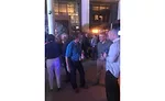 Conversation was in full bore during the after-hours rooftop party