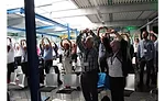 Egger shows attendees an excerize to increase oxygen to the brain