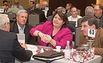 Keeney Mfg. Co.’s Karen Fox talks to a customer