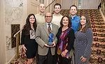 Mid-City Supply’s Jeff New (front row, second from left) with his family after being named the recipient of the 2016 ASA Plumbing Division Award of Excellence. Photo by Bob Levy and Courtesy of ASA