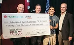 Fluidmaster presents a check for $25,000 to Operation Rise and Conquer during NETWORK2016