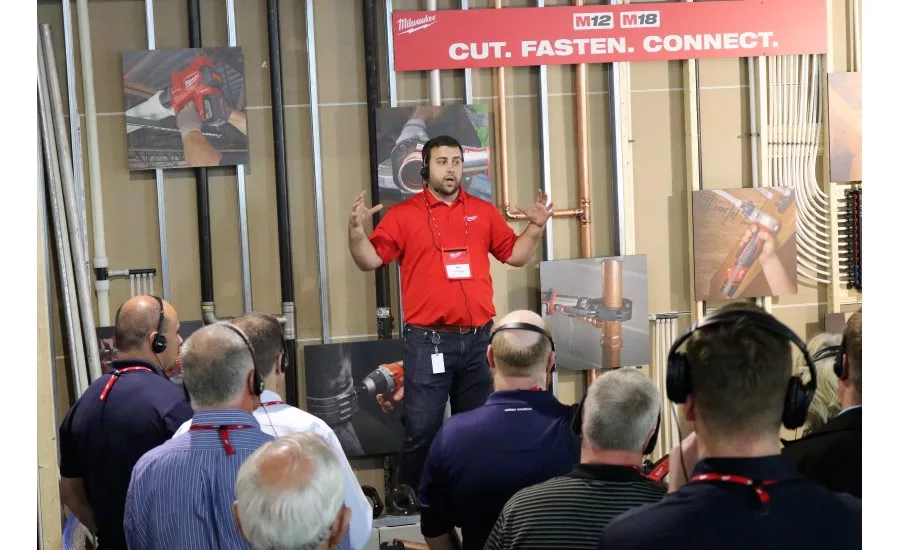 Senior Product Manager Alex Boll talks to contractors