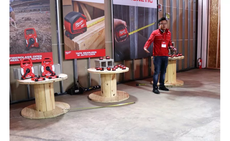 Product Manager James Wang demonstrates the durability of Milwaukee Tool&rsquo;s STUD Tape measure