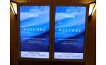 A welcome sign to the grand opening celebration for the new Moen showroom
