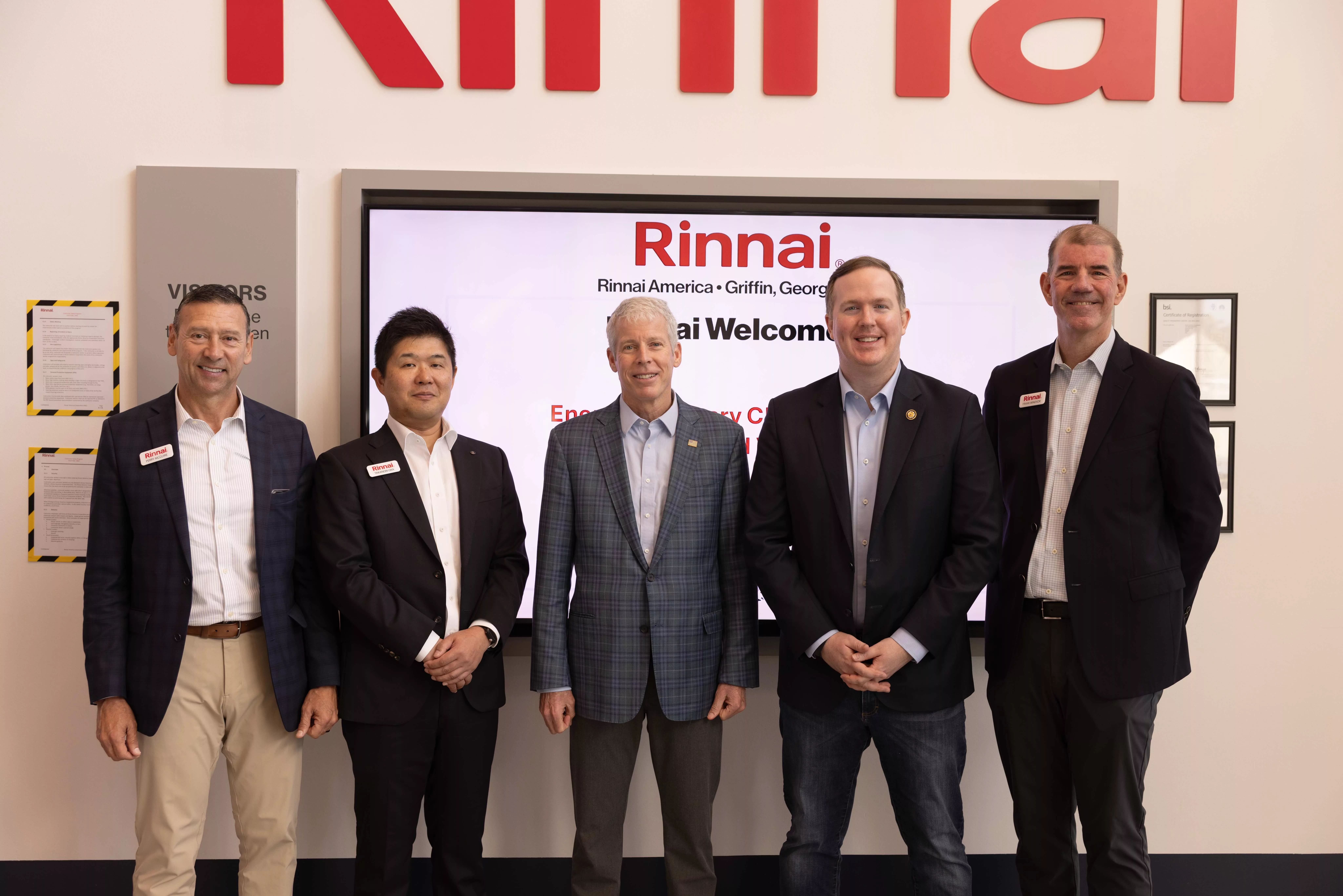 Several members of the Rinnai team, along with Chris Wright and Congressman Brian Jack.