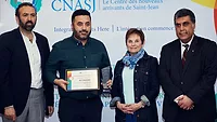 The NTI team accepting the award. 