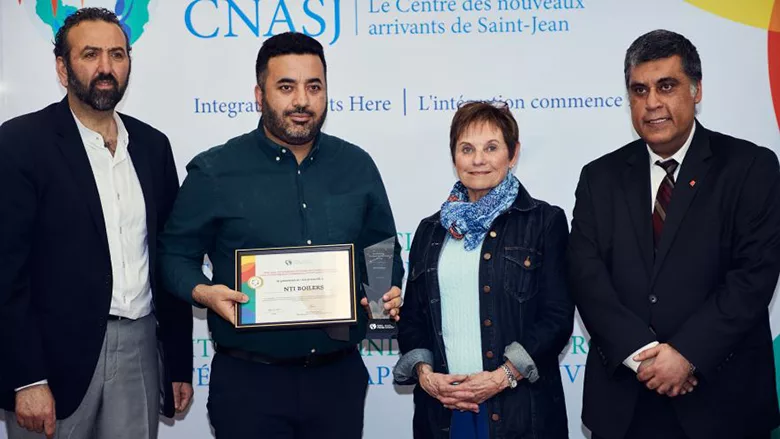 The NTI team accepting the award. 