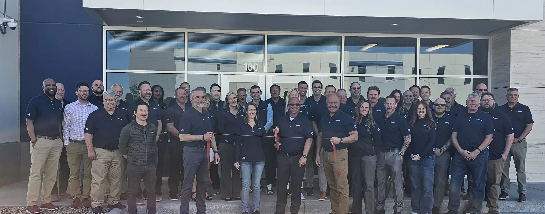 The mSupply team in front of its newest distribution center.