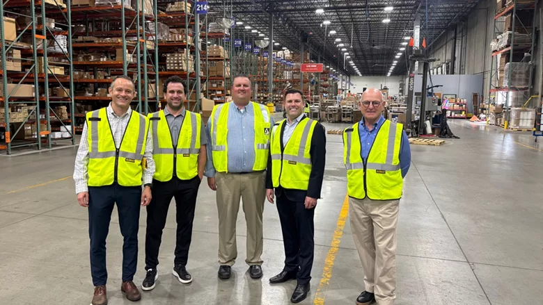 Congressman Ryan Mackenzie and several workers at Johnstone Supply - The Wallace Group. 