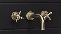 California Faucets Tiburon wall mount faucet with cross handles in Satin Brass (PVD) finish.