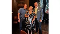Sheryl Sabin, the newest recipient of the Bob Bender Legacy Award, with Nichols and Alex Messmer. 