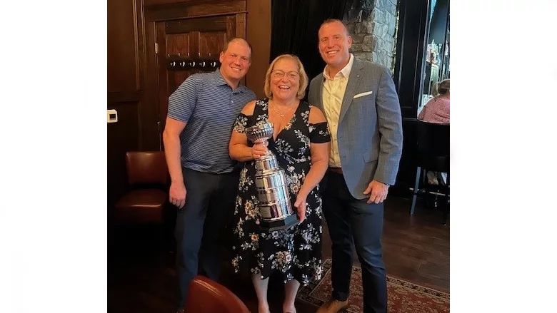Sheryl Sabin, the newest recipient of the Bob Bender Legacy Award, with Nichols and Alex Messmer. 