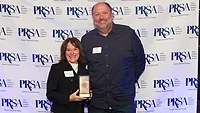 Rosemarie Ascherl and Matt Sonnhalter accepting the PRSA Rocks Award. 