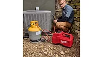 The Milwaukee Tool M18 brushless refrigerant recovery machine. 