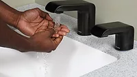 Americans wash hands more during flu season, but everyday habits still fall short, new survey finds A person washing their hands.