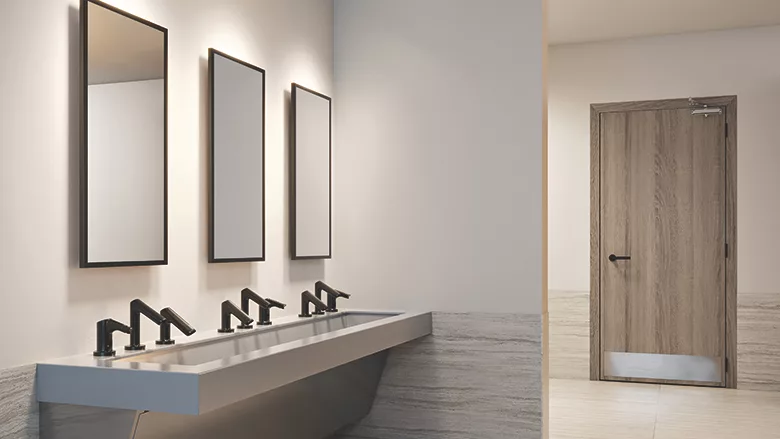 A restroom with Sloan accessories.