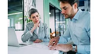 Two People Discussing Marketing 