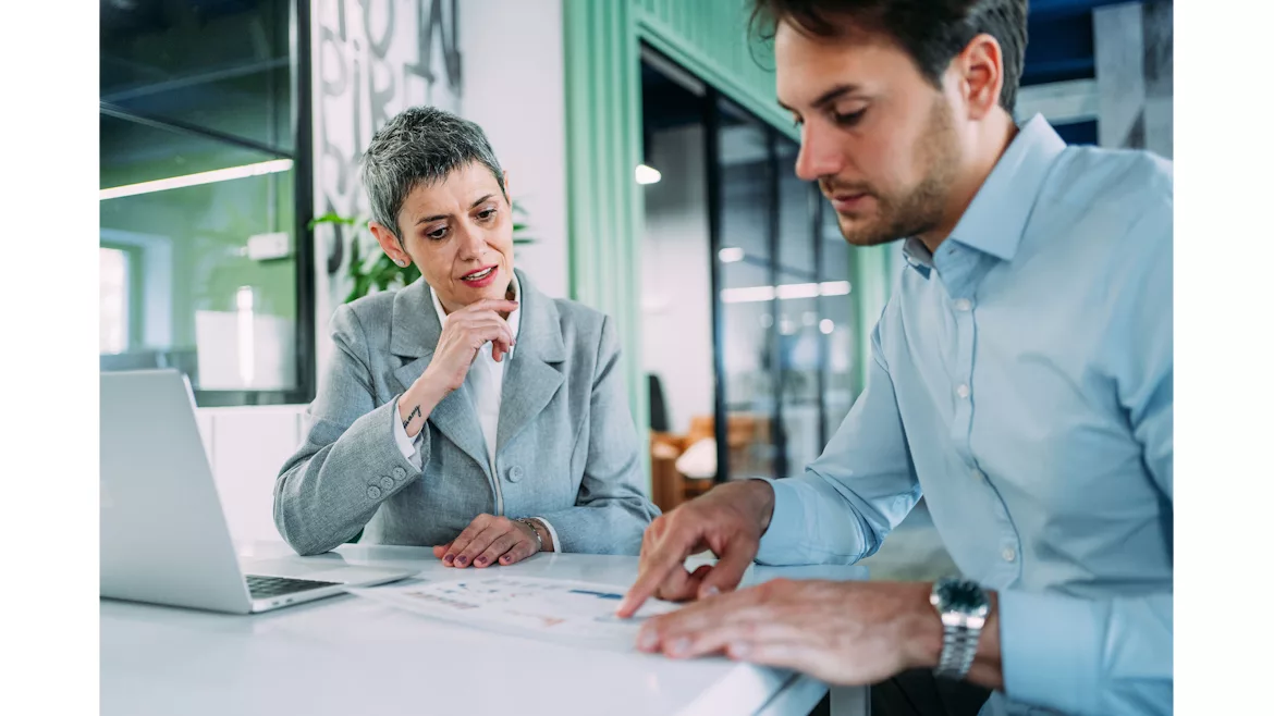 Two People Discussing Marketing 
