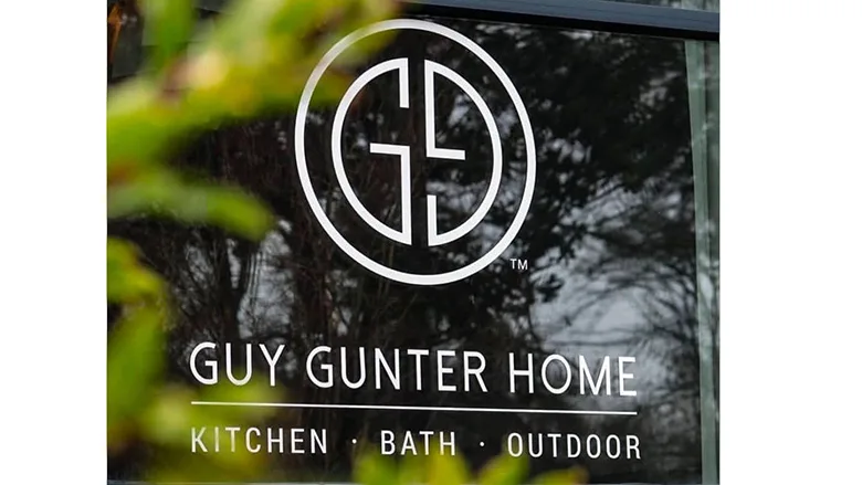Guy Gunter Home's logo on a window.