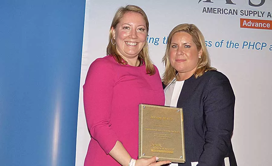 NIBCO’s Ashley Martin (left) is honored by ASA Women in Industry Chairwoman Christy Maloney (Coburn Supply)