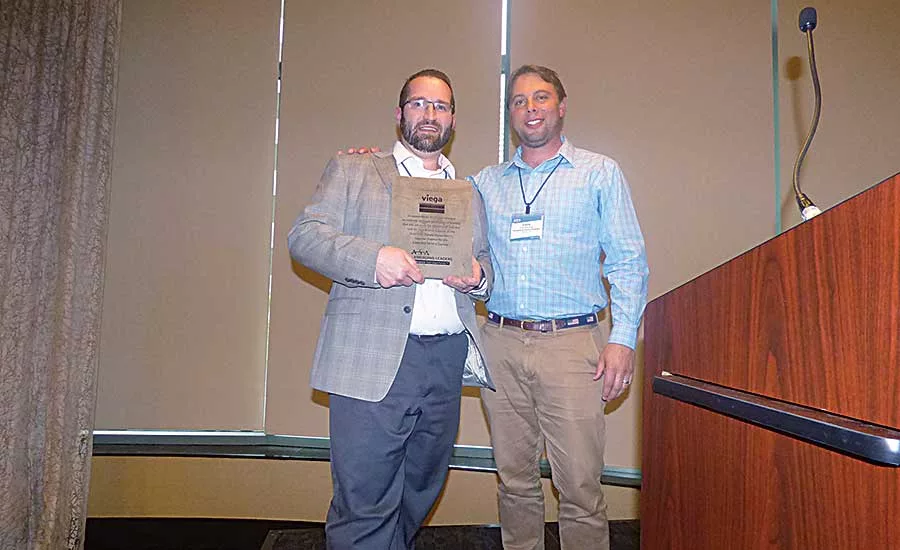 Viega’s Jason McKinnon(left) and ASA Emerging Leaders Chairman Chris Reynolds(right)