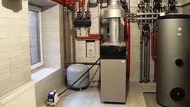  house is heated by a Utica Gas Boiler