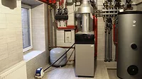  house is heated by a Utica Gas Boiler