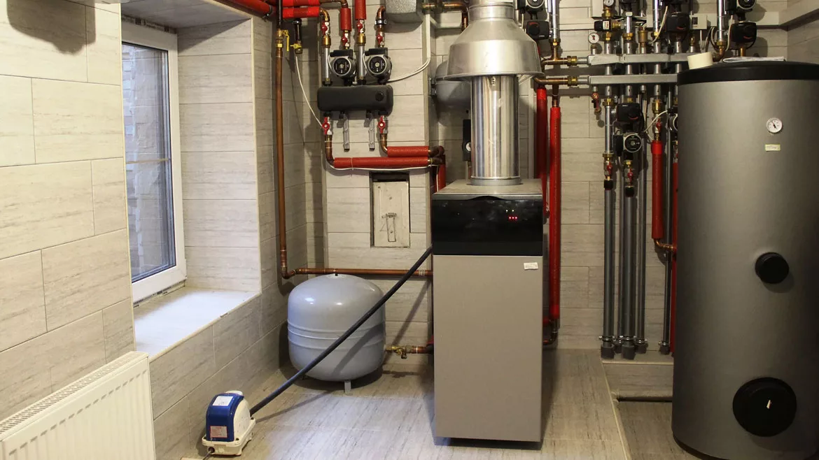  house is heated by a Utica Gas Boiler
