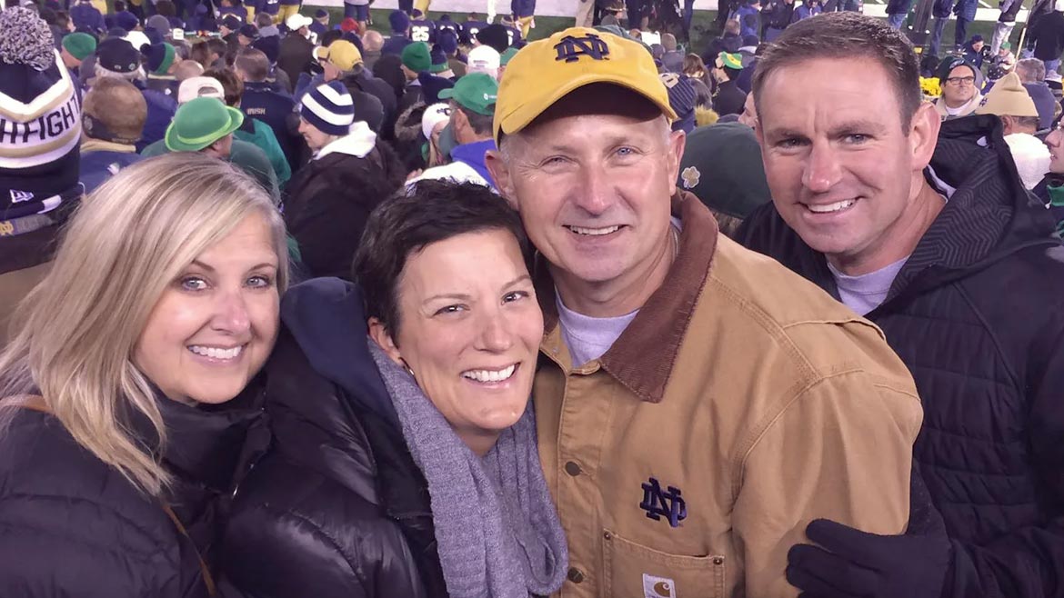 Falish and her husband Paul enjoying a Notre Dame Football game with her good friend