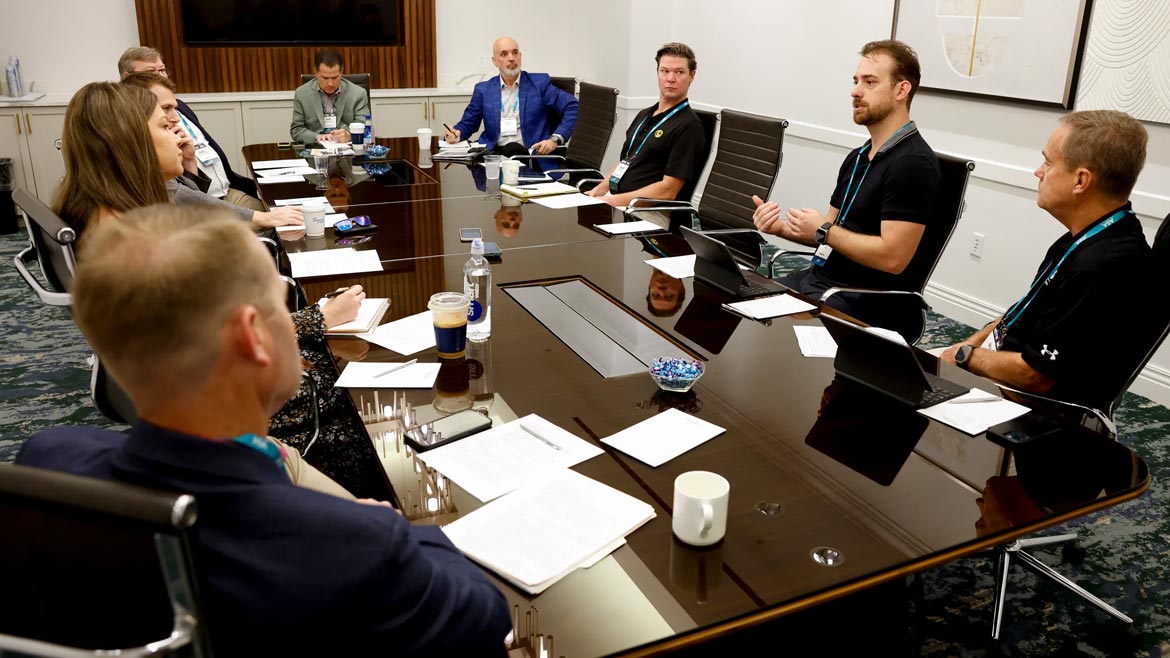 2023 ASA-Supply House Times roundtable participants sitting at a conference table having a discussion.