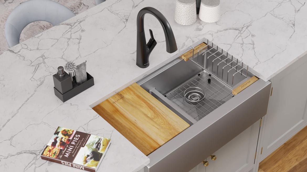 KBIS Product Preview: Elkay workstation sink on marble countertop in kitchen.