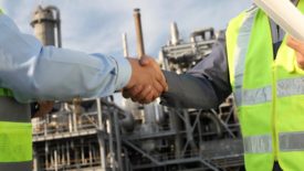 Industrial Distribution feature image of two men shaking hands