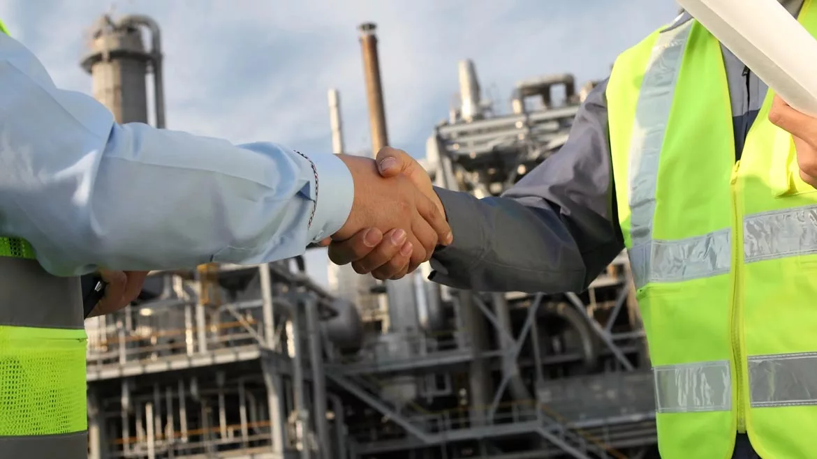 Industrial Distribution feature image of two men shaking hands