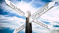 Street signs that say: Regulations, Standards, Policies, and Compliance