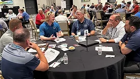 Members having a discussion at the ASA Northeast Summit.