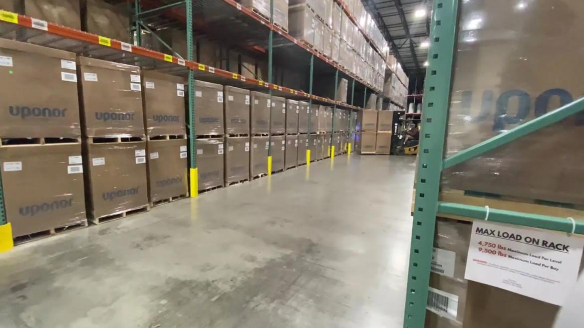 Uponor products on a shelf in a warehouse