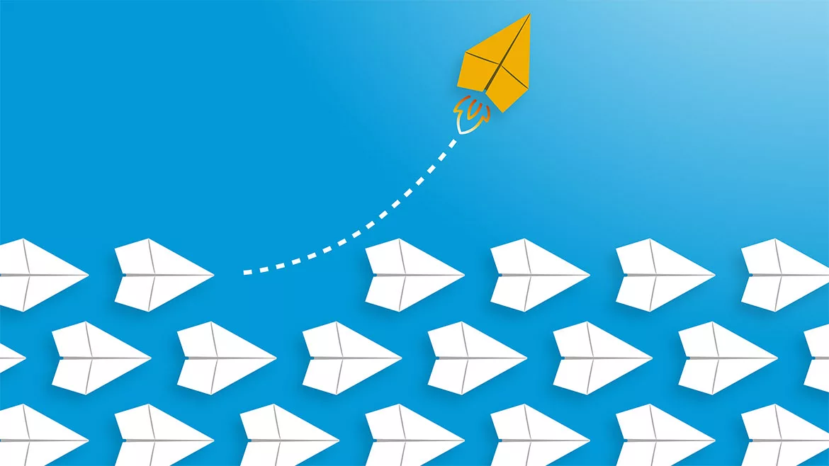 Change concept: A yellow paper airplane flying a way from the rows of white paper airplanes.
