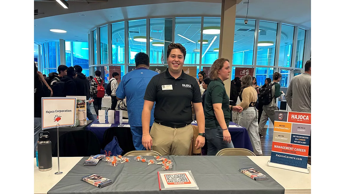 Jack Davide of ASA-member distributor Crawford Supply (Hajoca) at a Fenton High School job fair in suburban Chicago.