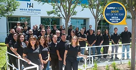The Mega Western Sales Customer Service Team posing for a group photo outside their office building.