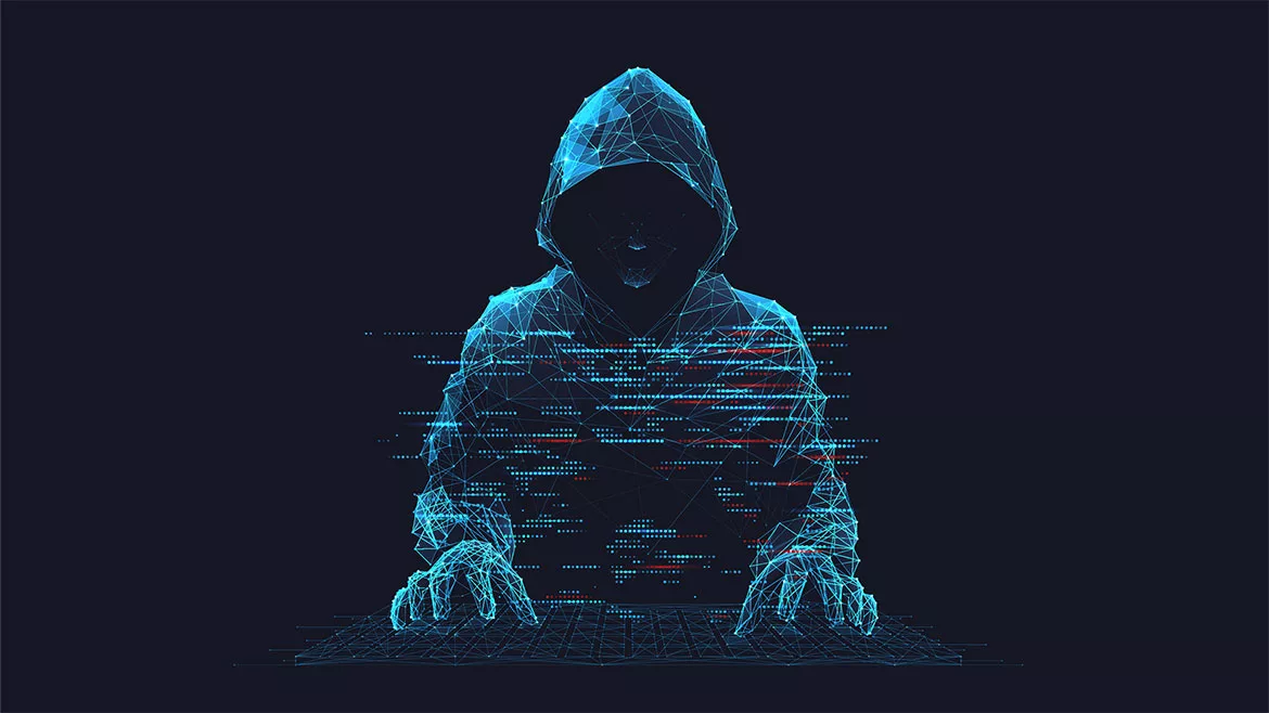 Cyber security concept. A virtual man wearing a hoodie with a hidden face in front of a computer.