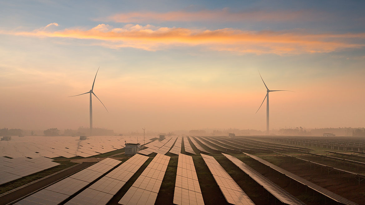 Solar panels and windmills in the power plant.