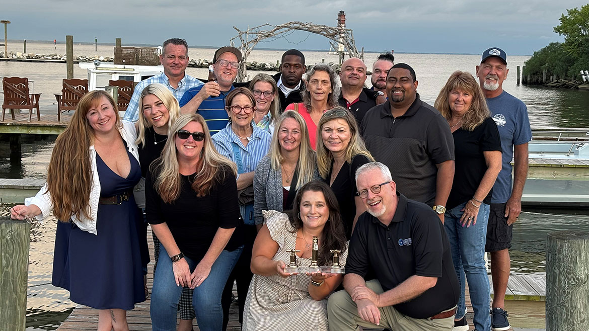 Showroom associates and customers enjoying a night out with BRIZO for crabs.