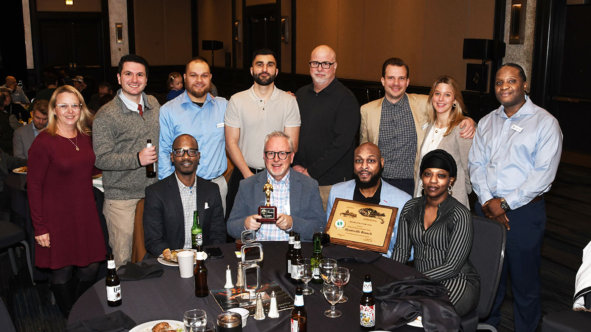 Company Banquet – Hyattsville Branch of the Year and Troy in the middle won a Tommy Award – most of these people are Owings Mills Associates