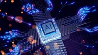 Computer chip labeled 'AI' on a circuit board, illuminated by a cool blue glow, highlighting circuit pathways and components.