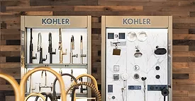 WhiteStar Supply showroom showing two Kohler displays, the left showing faucets, the right showing shower fixtures.