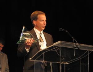 Glenn Mosack of Apollo Valves accepts the 2014 PVF Supplier of the Year award