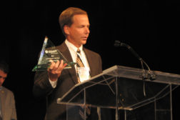 Glenn Mosack of Apollo Valves accepts the 2014 PVF Supplier of the Year award 