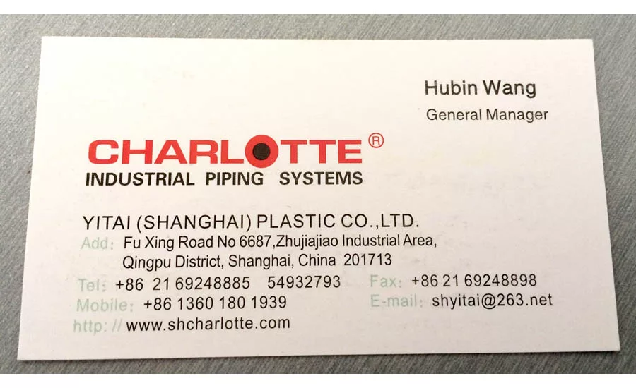 An example of Shanghai, China-based company Yitai Plastics using business cards with the Charlotte Pipe logo on them.